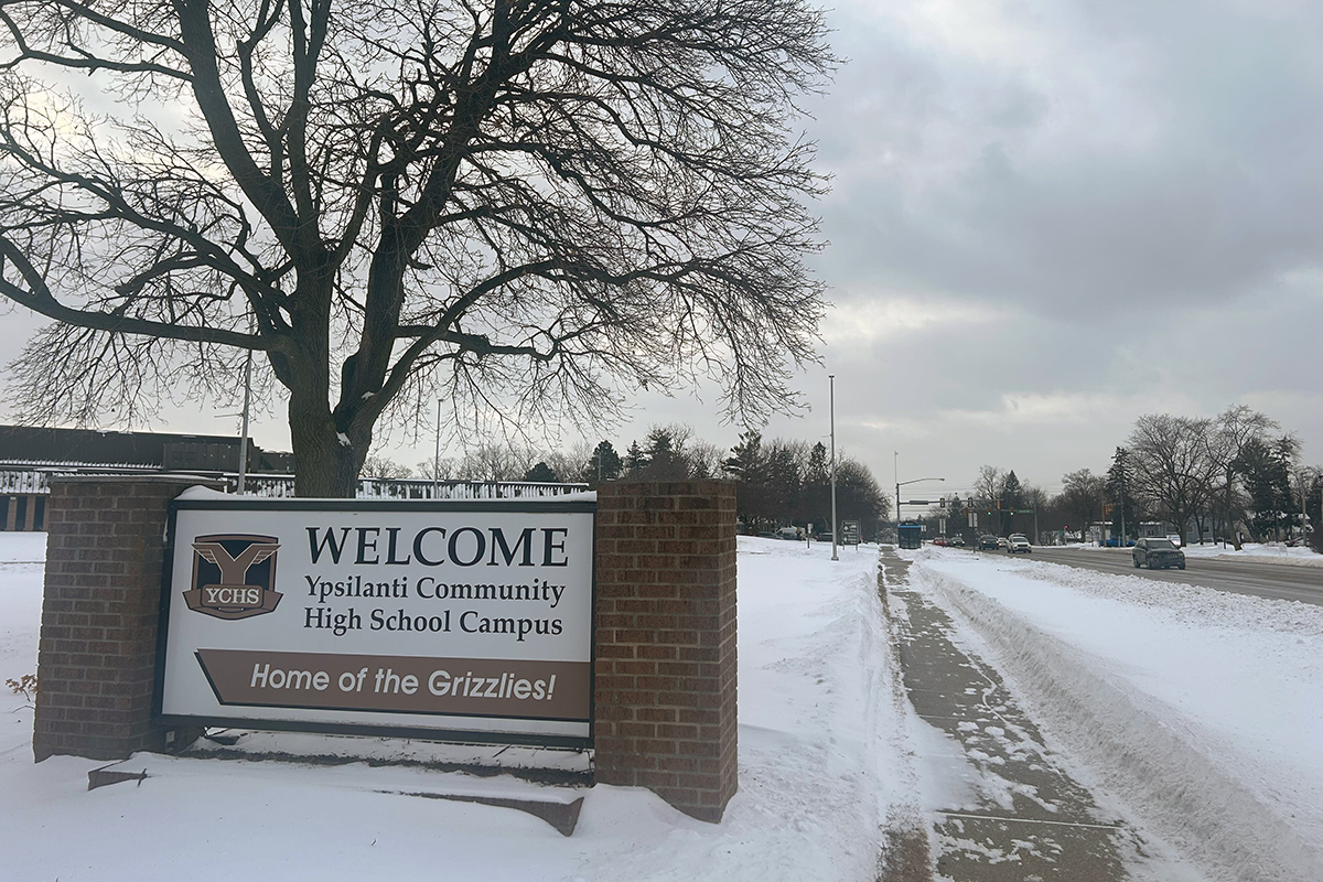 A welcome sign outside a high school campus in Ypsilanti