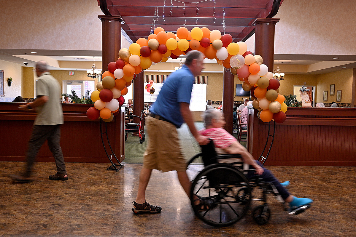 Mid-day hustle and bustle in the halls of The Willows of East Lansing nursing home on Friday, Sept 19, 2025.