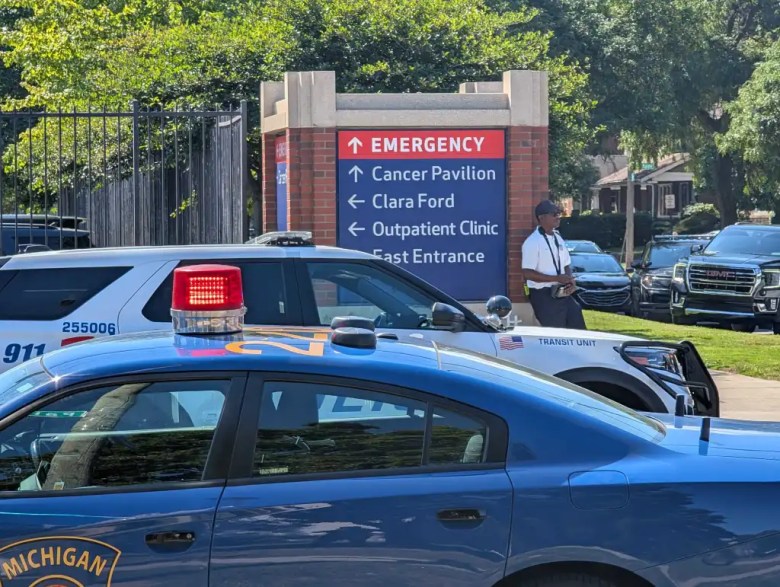 Law enforcement vehicles outside the hospital.