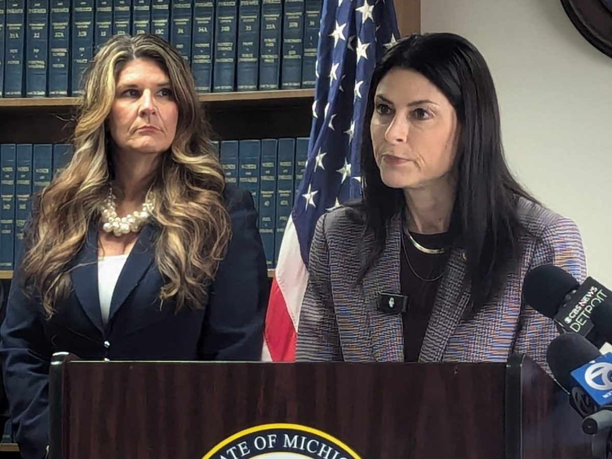 Dana Nessel speaking into a microphone.