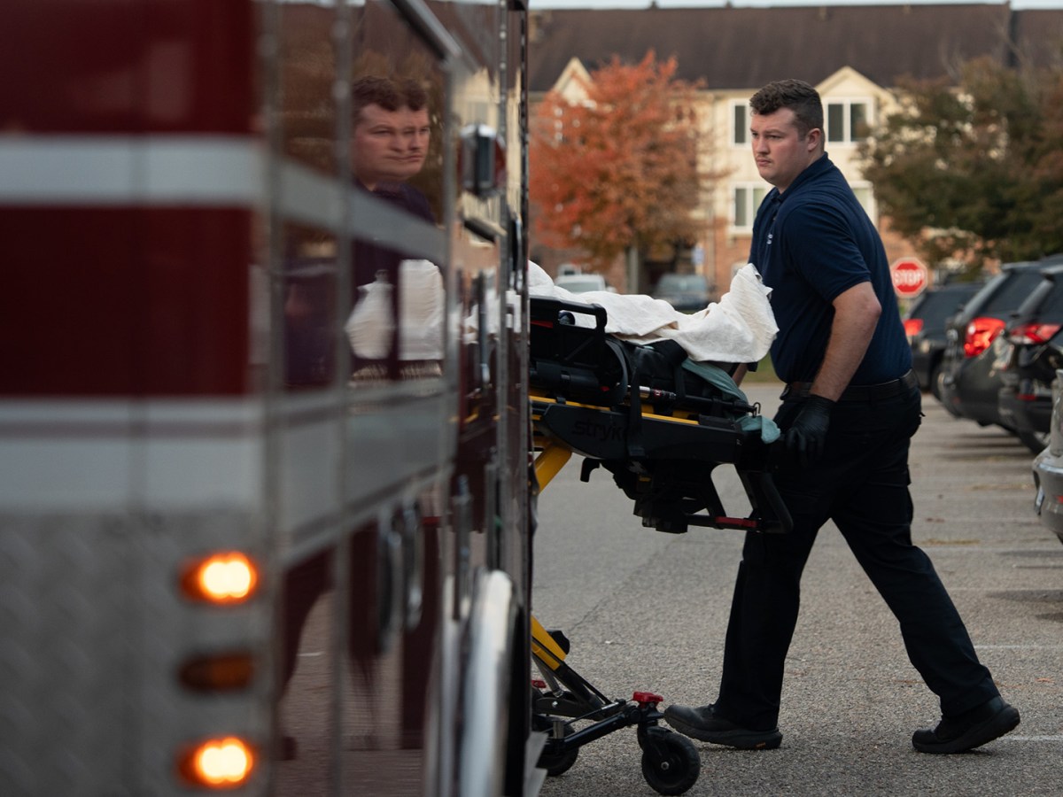 Firefighter/EMT Camden Ramirez, 25, loads a stretcher after a non-emergency call in Westland, Mich.
