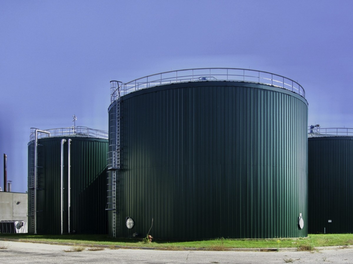 Three green silo-looking structures. It's the shuttered biodigester in Fremont, Michigan