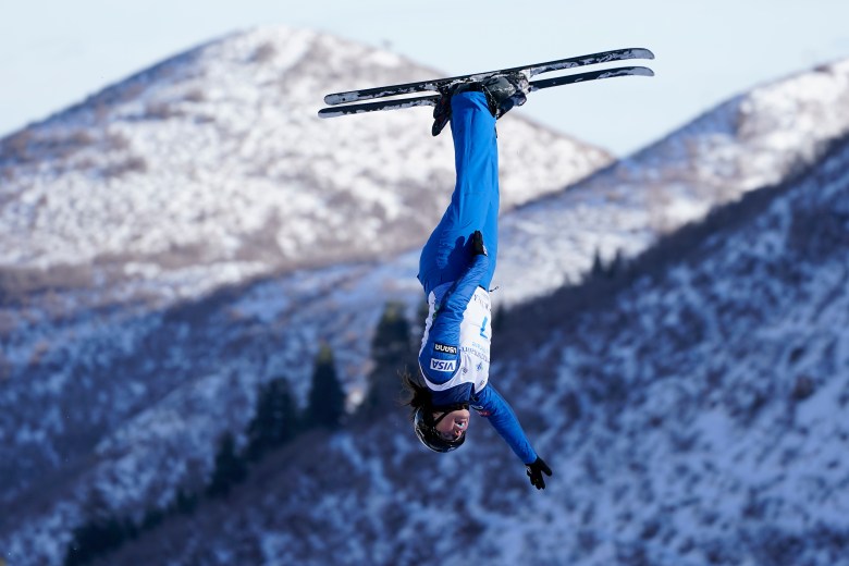 Kaila Kuhn is upside down while skiing. 