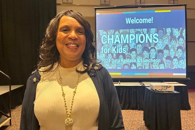 Beverly Walker-Griffea smiles while posing for a photo