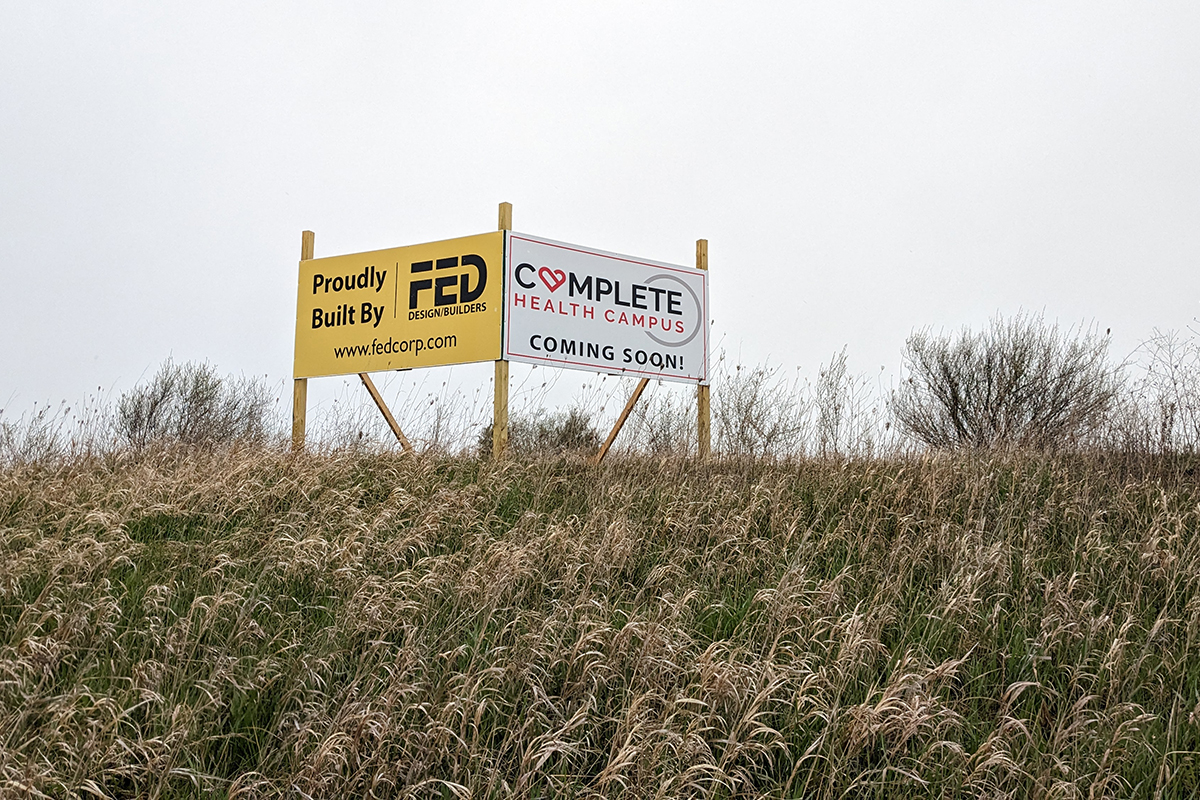 A sign for a Clare health park project in Michigan.