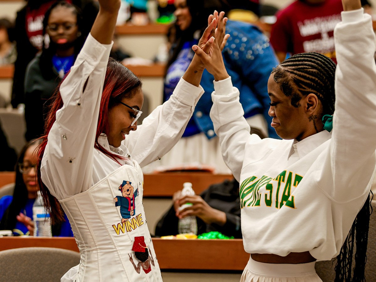 Two girls celebrate at the College Decision Day event in May.