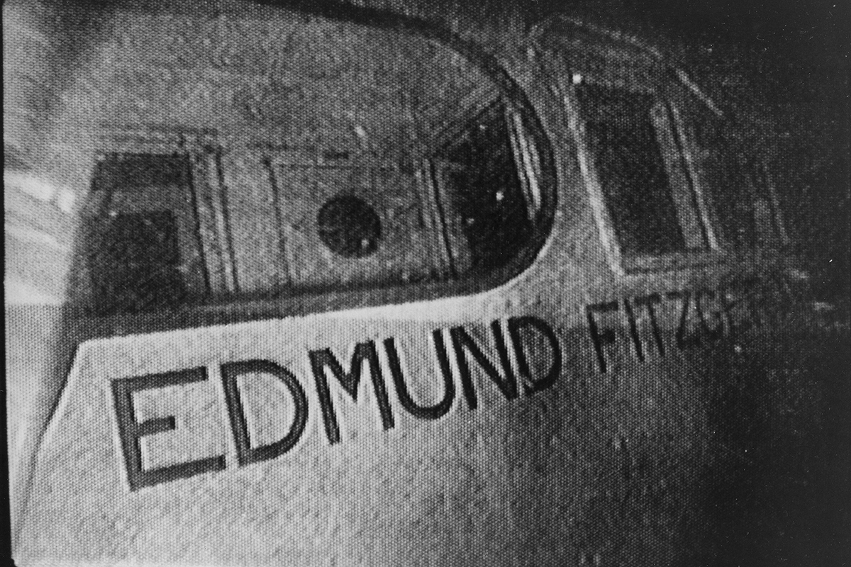 A grey, underwater photo of the sunken SS Edmund Fitzgerald.