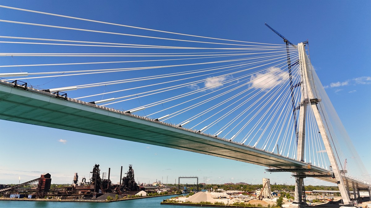 The Gordie Howe International Bridge in Detroit, MI. The shot depicts the tower on the US side with Zug Island situated under and behind the bridge.