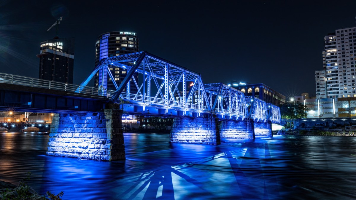 A bridge is seen at night in downtown Grand Rapids