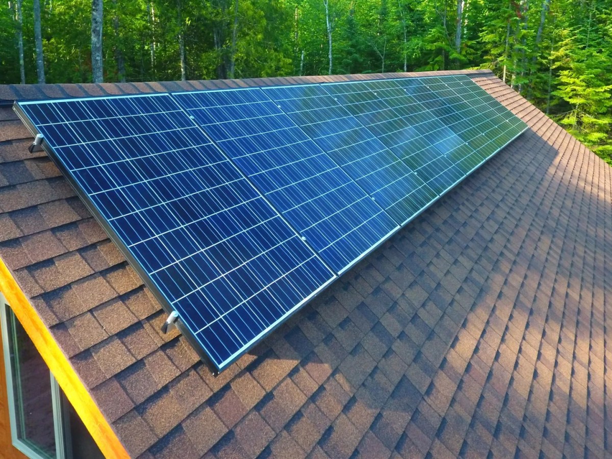 A solar panel on the roof of a home