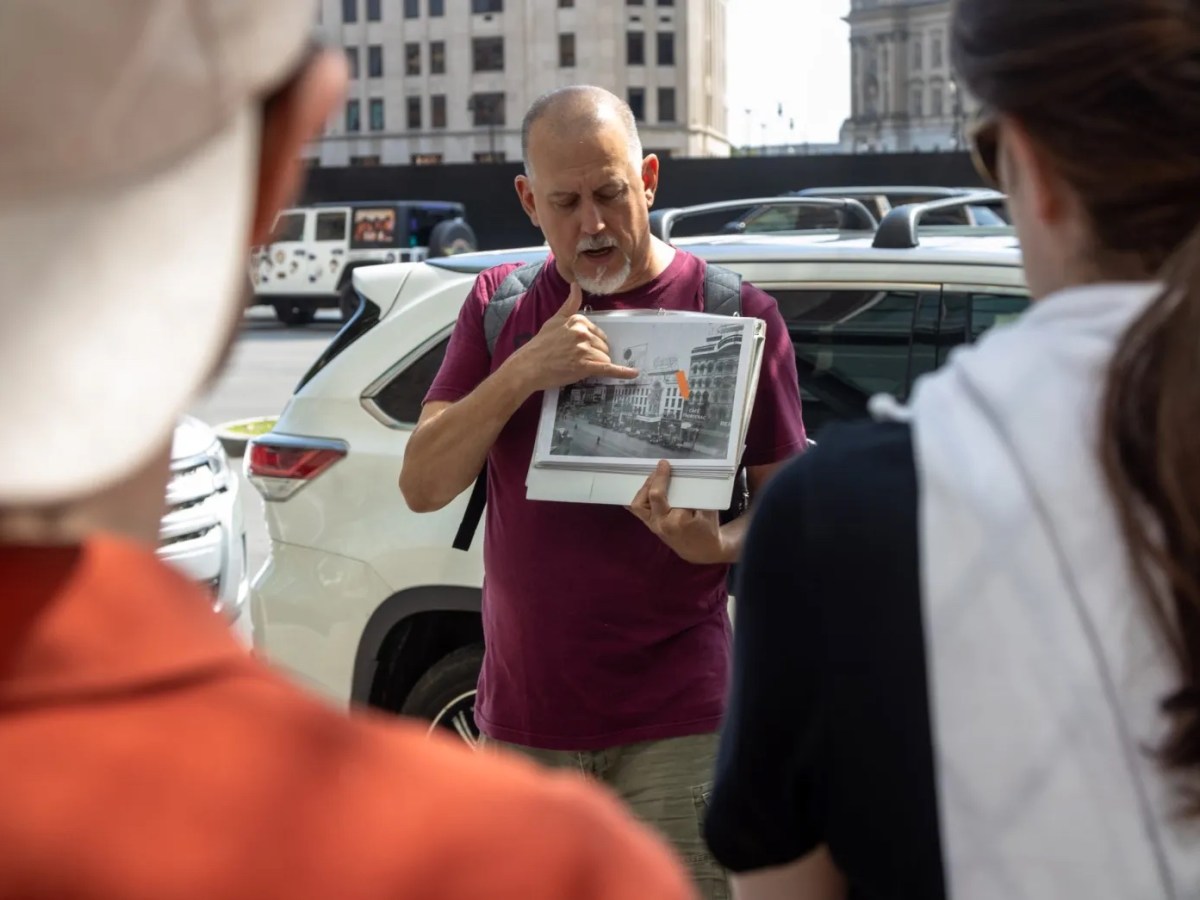 Michael Boettcher pointing to a paper