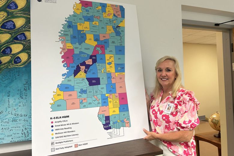 Michelle Nowell points to a map of Mississippi.