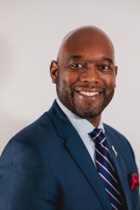 Headshot of a man smiling