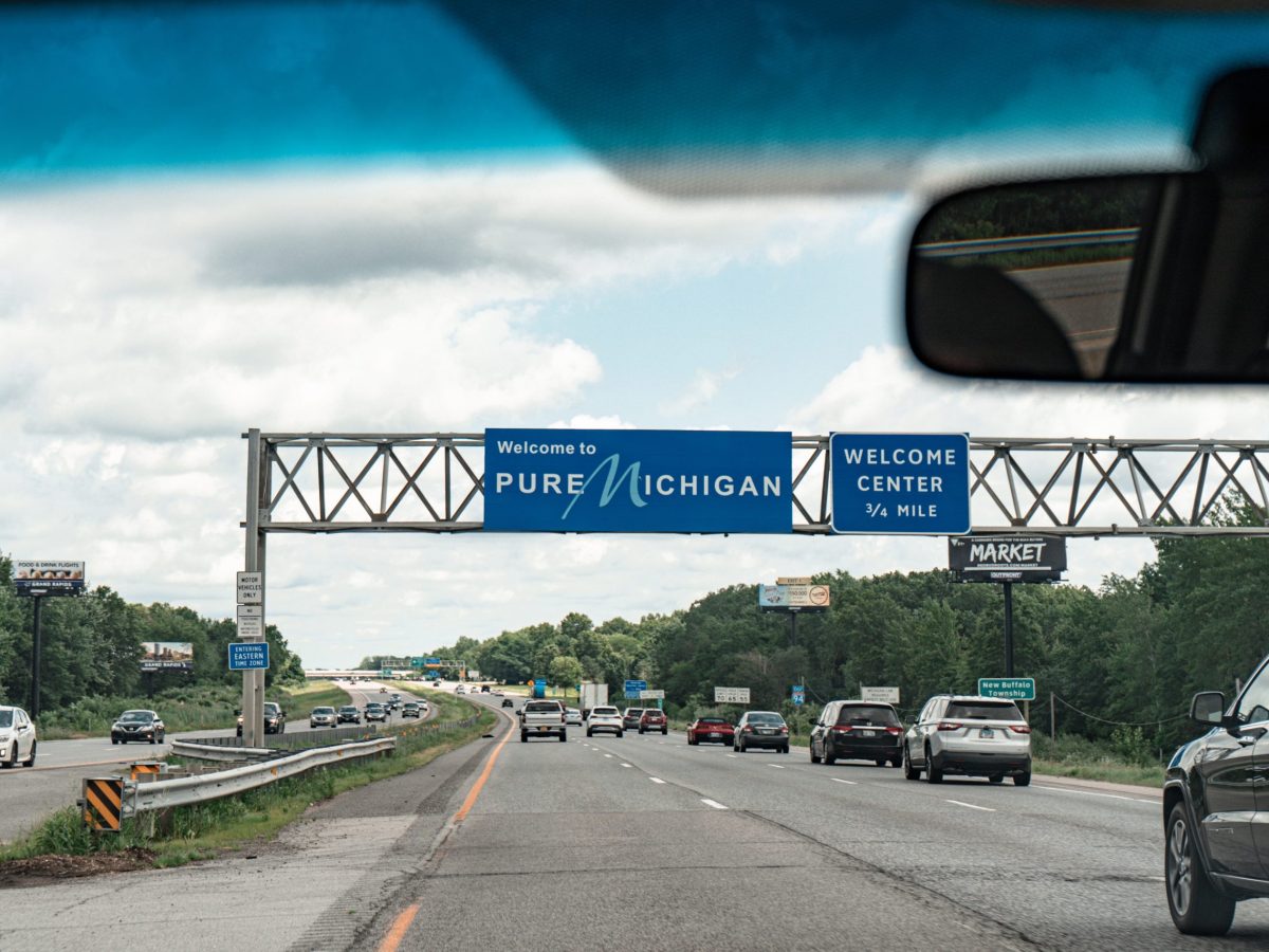 Highway and pure michigan sign