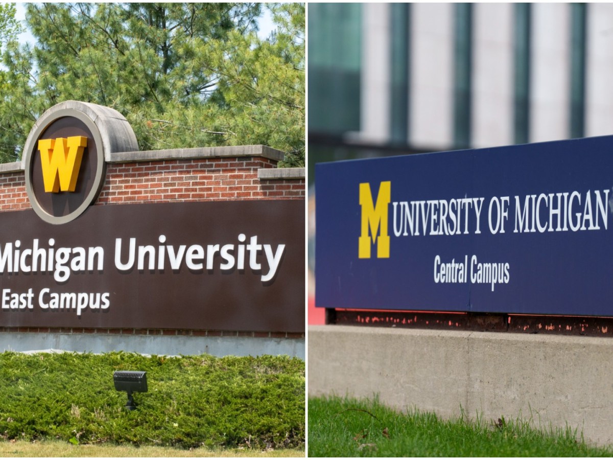 Signs for the Western Michigan University and the University of Michigan.