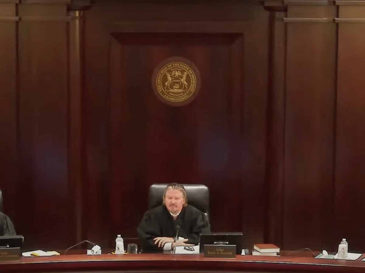 Three Michigan Court of Appeals Judges behind the bench.